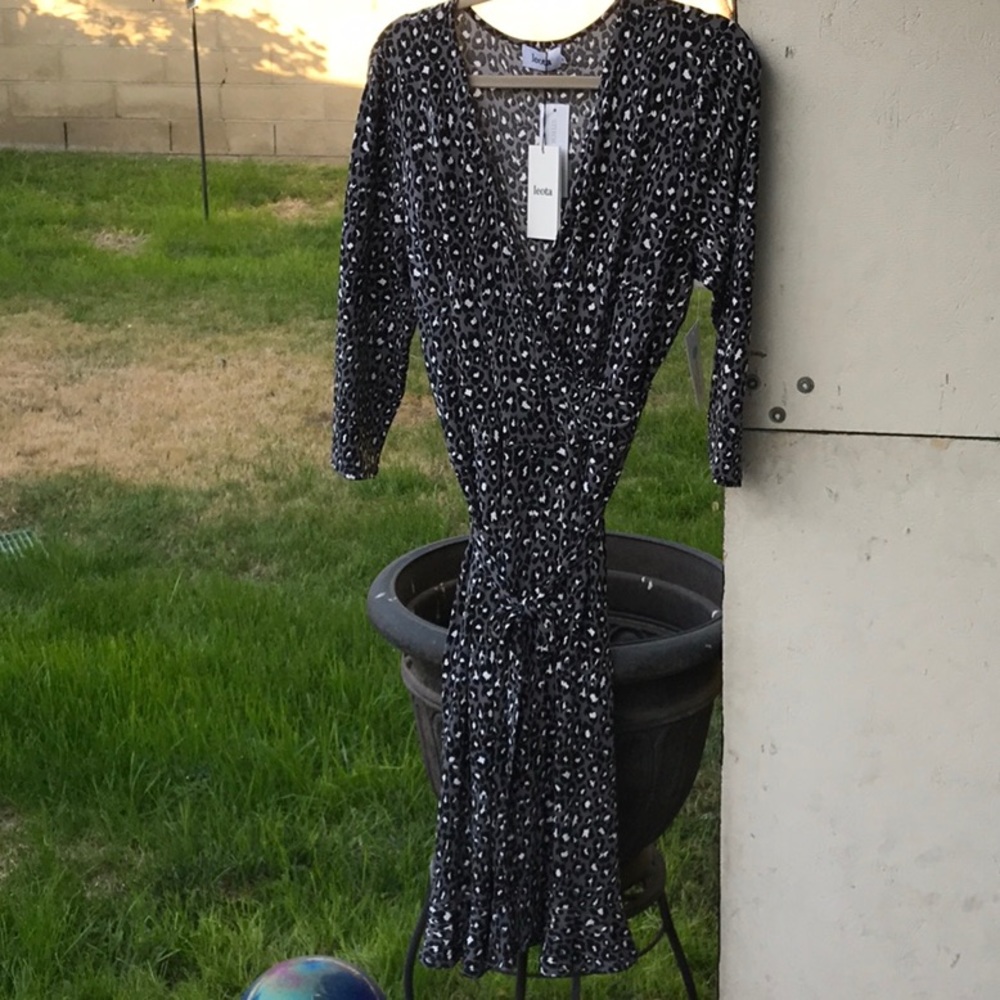Very stylish leopard print wrap dress brand new